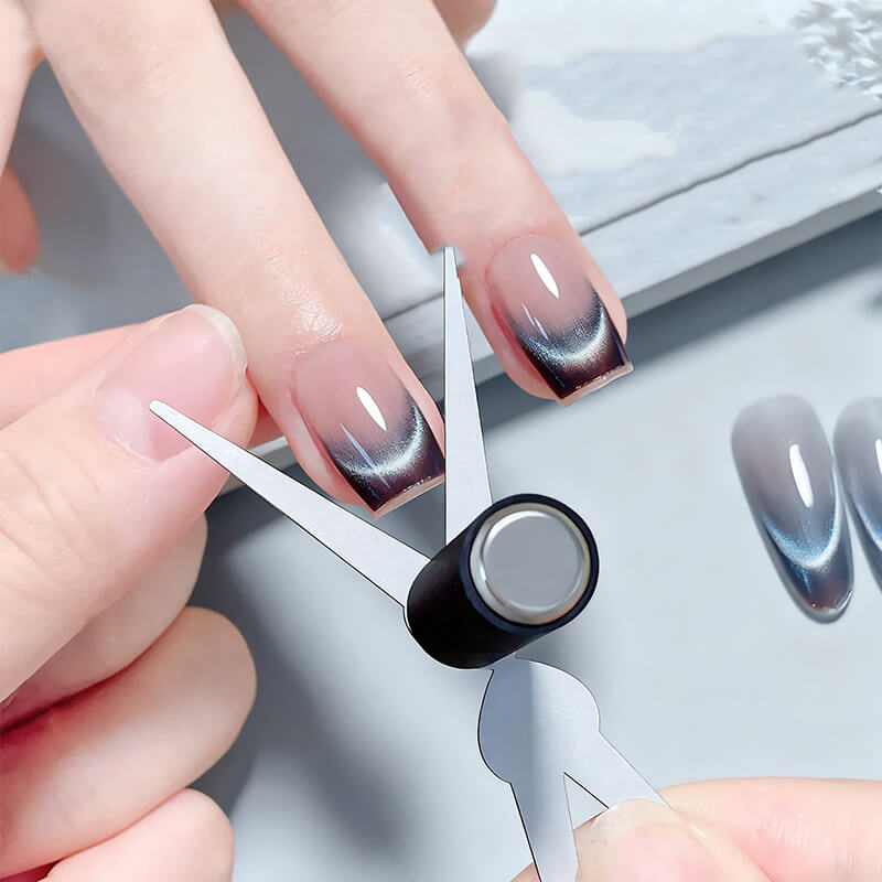 Close-up of cat eye magnet end of double-ended tool showing magnetic surface