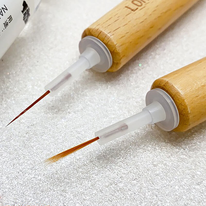 Assorted replacement brush heads in fine liner and detail sizes for nail art