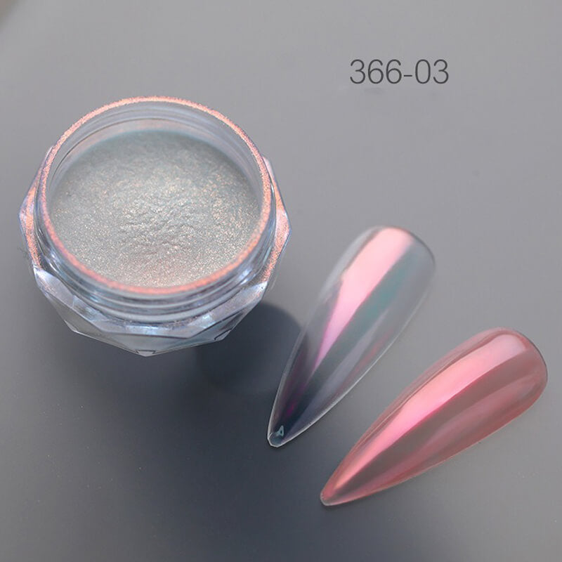 Mirror chrome effect dust container with prismatic color-shifting powder visible