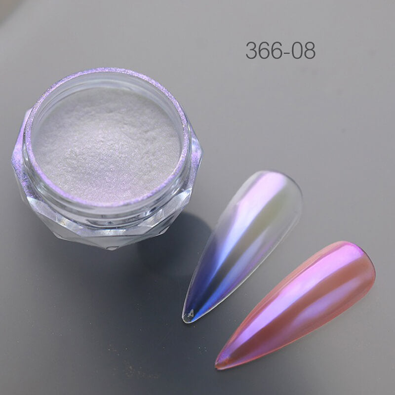 Jar of nail glitter with a colorful nail next to it on a gray background