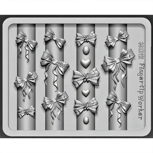 Close-up of silicone mold for bow nail art
