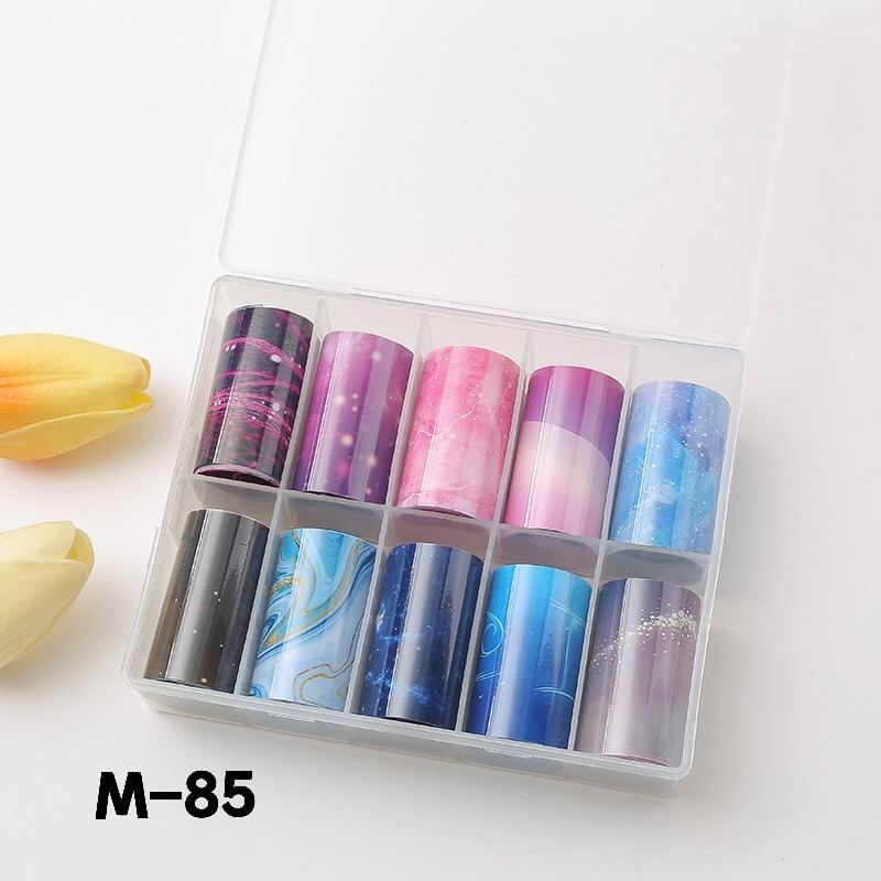 Essential galaxy nail art supplies: 10-roll starry sky foil paper set with moon and star designs.