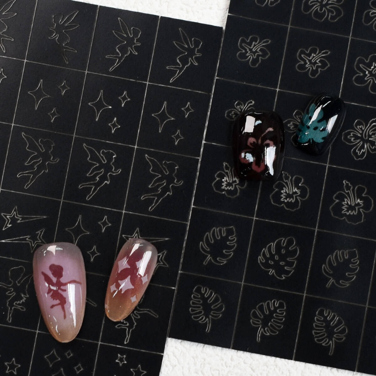 Mixed theme nail decal sheet with forest friends and underwater characters arranged together.