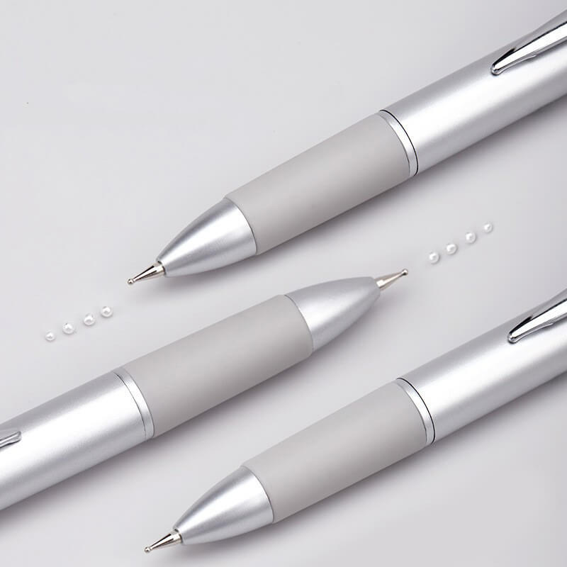 Complete 4 in 1 dotting pen with all four tips displayed alongside pen body