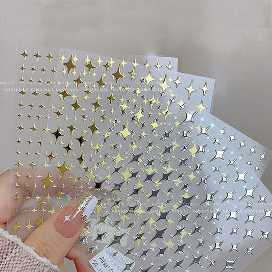 Star moon nail art stickers sheet with celestial designs in metallic and iridescent finishes
