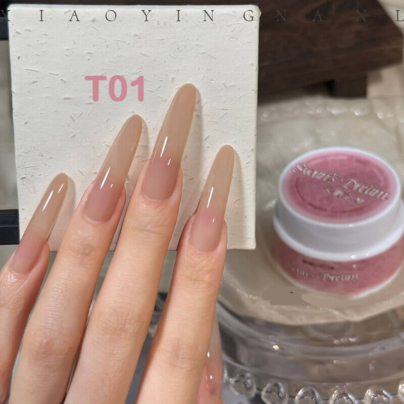 Hand model wearing soft nude gel polish creating clean natural look on nails.