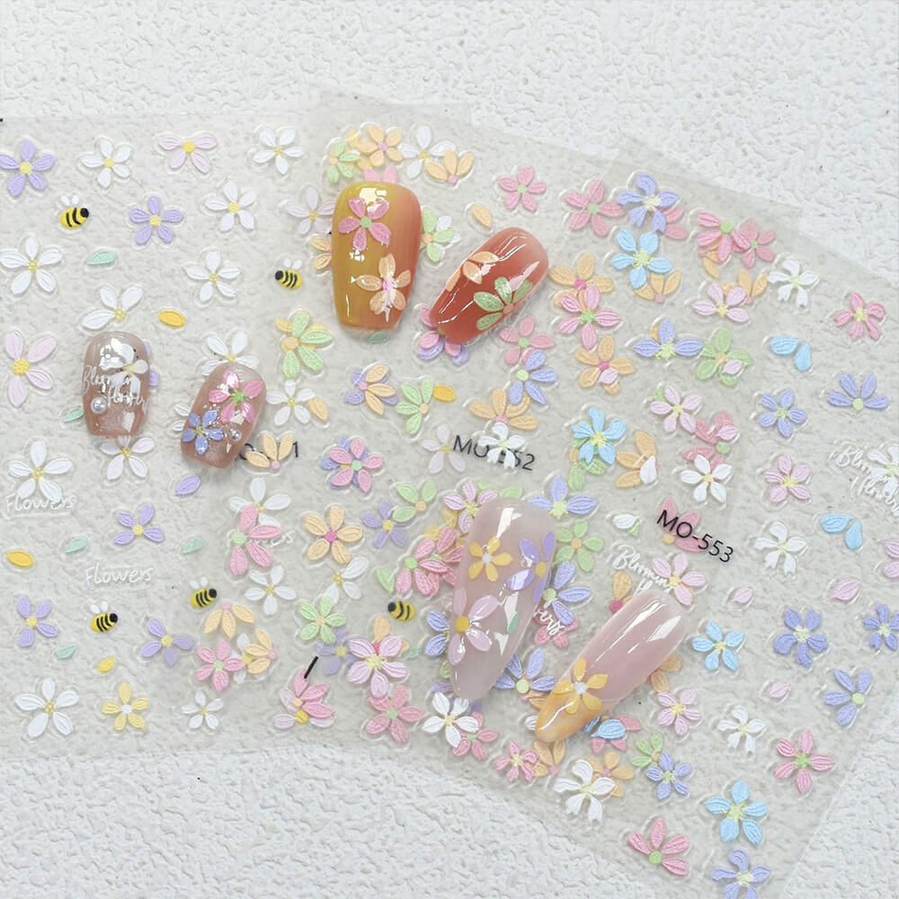 Close-up of embossed flower sticker showing raised petals and cheerful face details