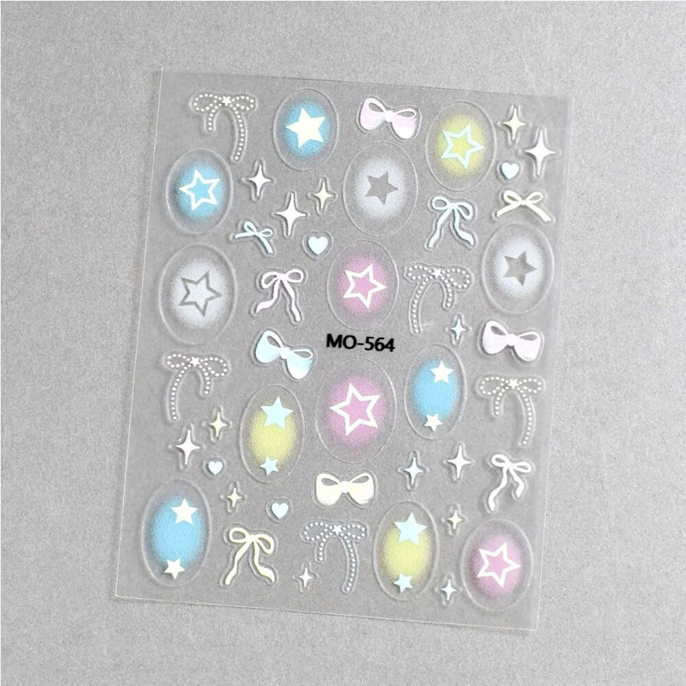 Hollow nail stickers sheet featuring cut-out hearts, stars, and bow shapes on clear backing