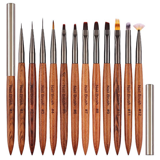 A collection of nail art brushes with wooden handles and metal tips, including various sizes for different nail art applications.