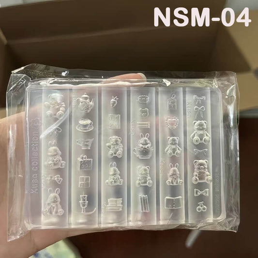 Kawaii kitchen-themed mold with bear faces, bunny silhouettes, cups, spoons, and treat shapes