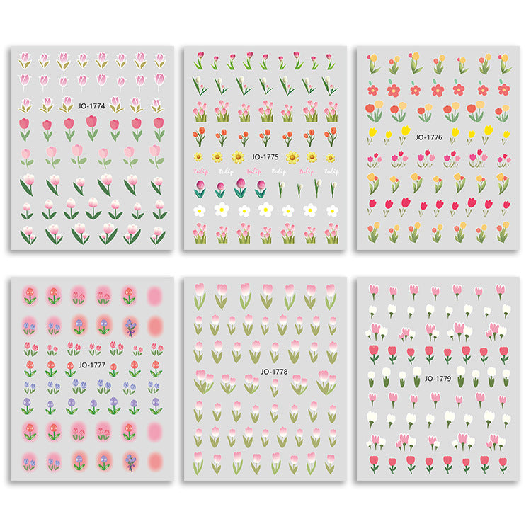 Assorted tulip designs including single blooms, buds, and floral clusters on sheet