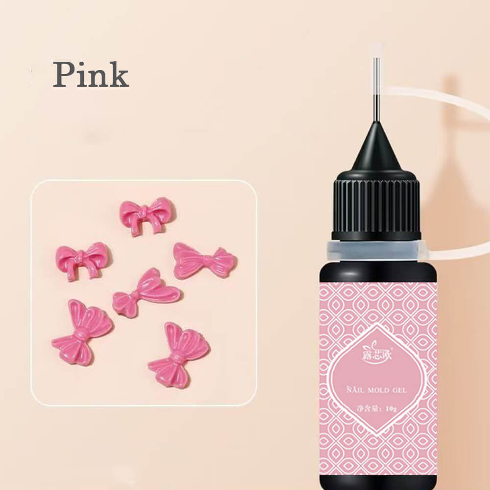 Pink Molding gel pressed into silicone mold to create 3D flower shapes