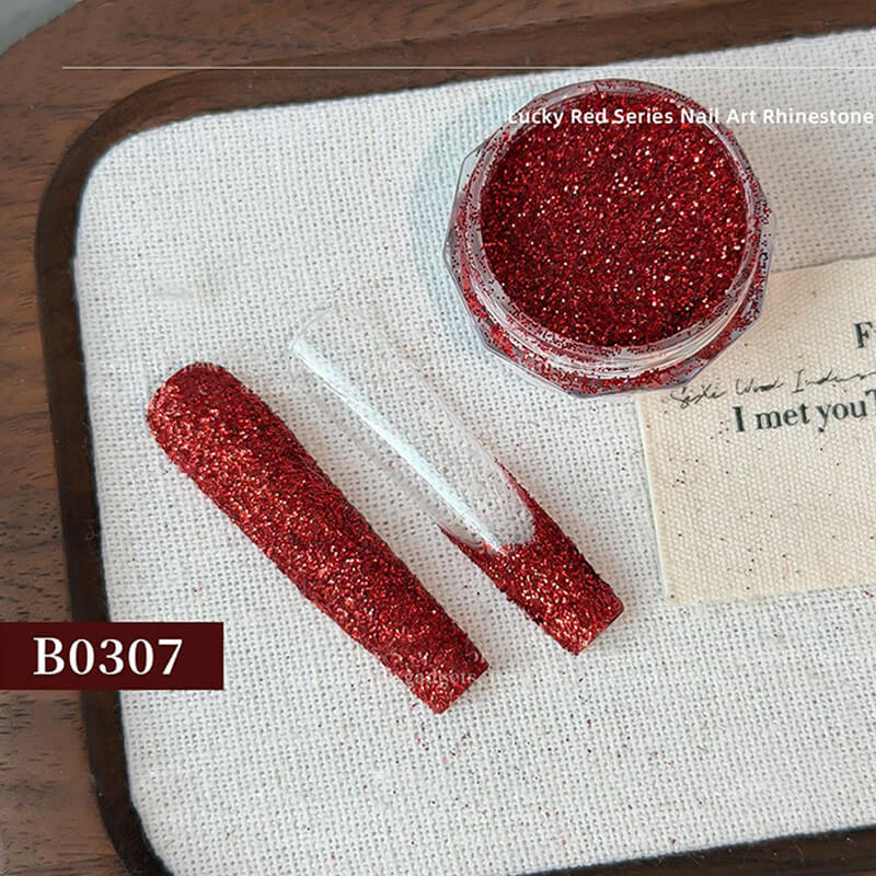 Ultra sparkly red glitter texture—crushed diamond effect in natural lighting.