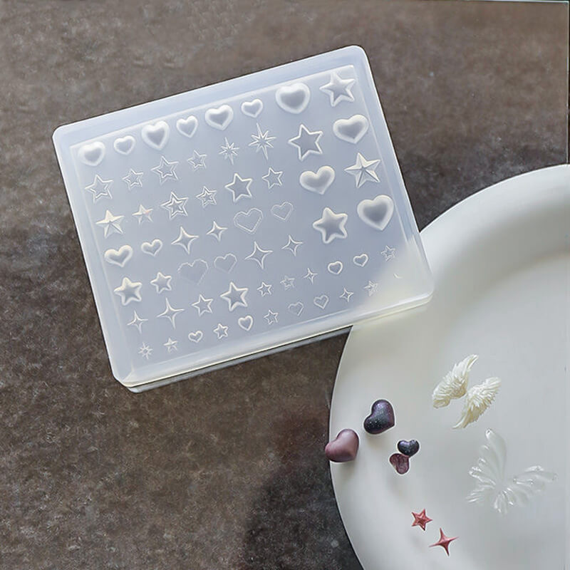 Heart and star nail silicone mold with multiple cavities in various sizes and designs