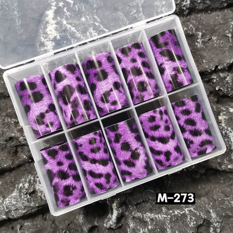 purple leopard print nail foil sheet showing warm brown and gold swirling patterns.