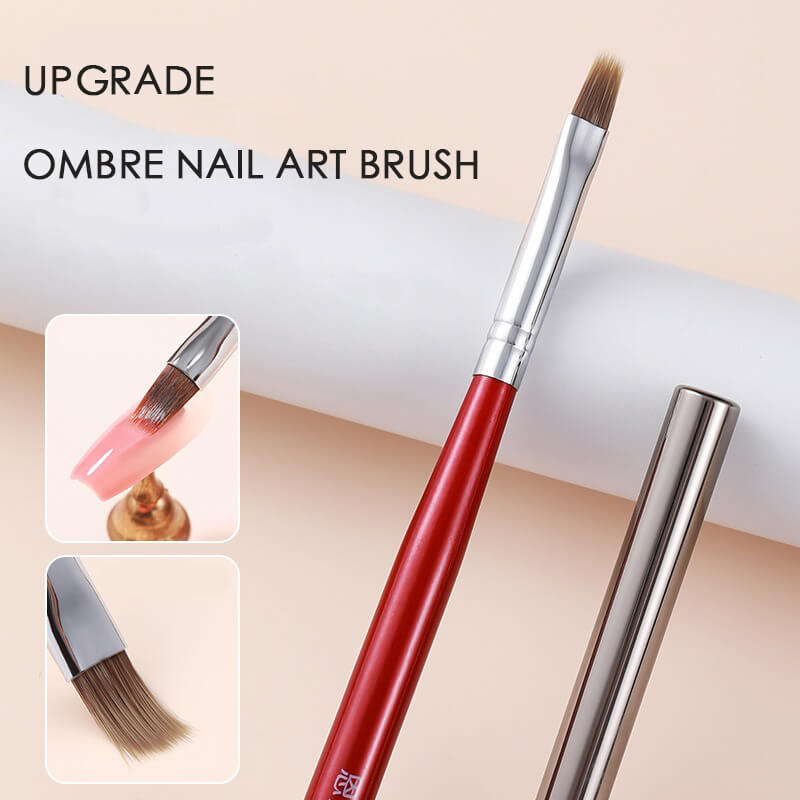 Nail artist using ombre brush to create seamless gradient from pink to white