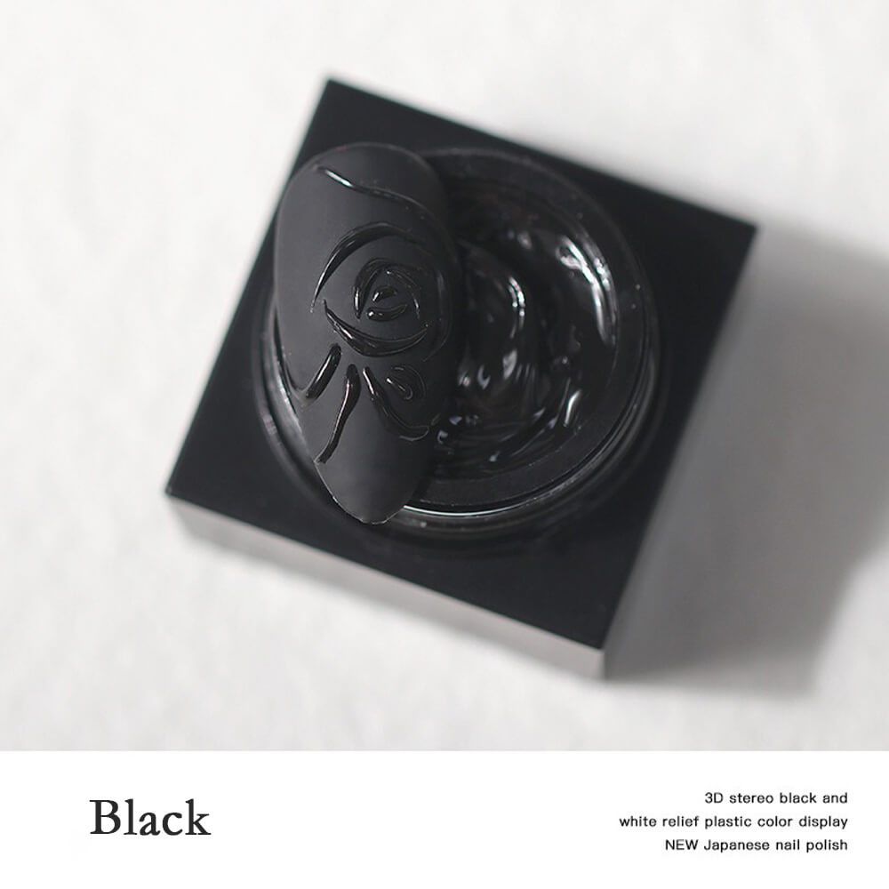 Hand model wearing embossed textured nails with raised 3D patterns