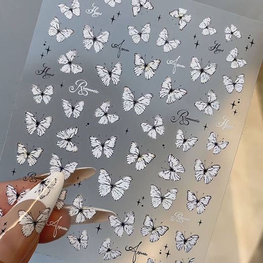 Butterfly nail art stickers sheet with elegant butterfly designs in assorted sizes