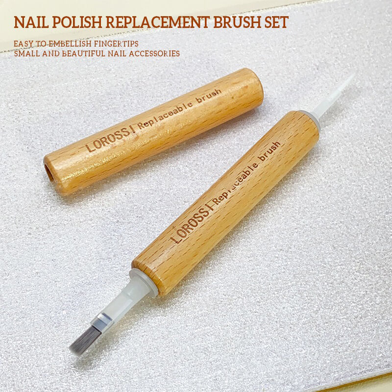 Close-up of double-ended handle showing two brush head attachment points