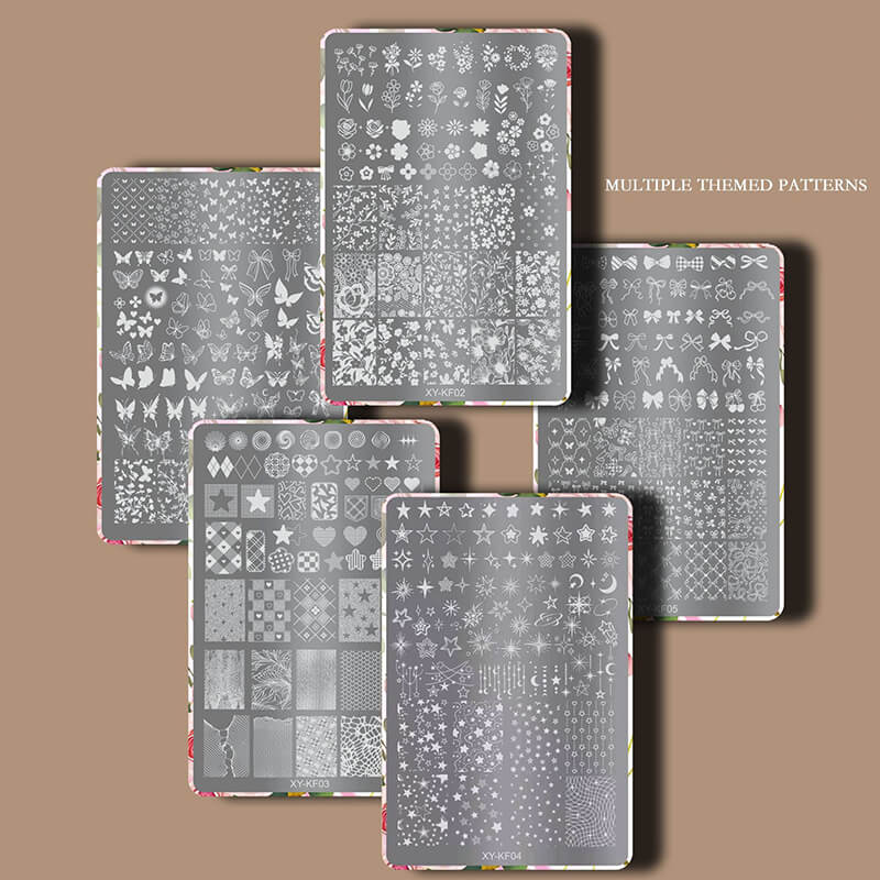 Set of six nail art stamping plates with various patterns on a brown background