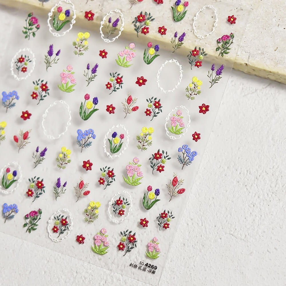 Embroidered floral sticker with dimensional petal texture like hand-stitched fabric
