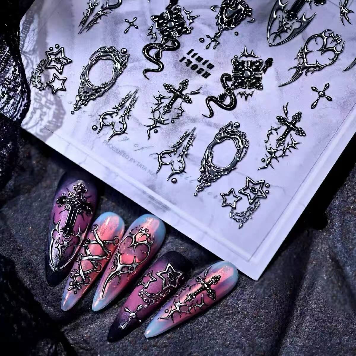 Gothic nail stickers featuring thorn hearts, crosses and snake designs