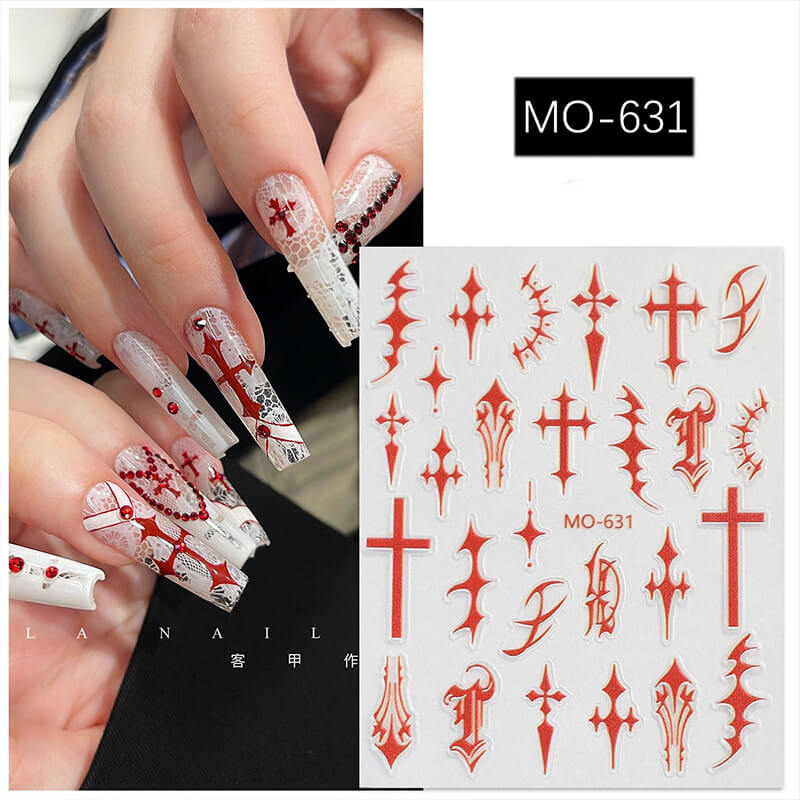 Hand model wearing Gothic black and red cross stickers with chrome heart accents on dark base.
