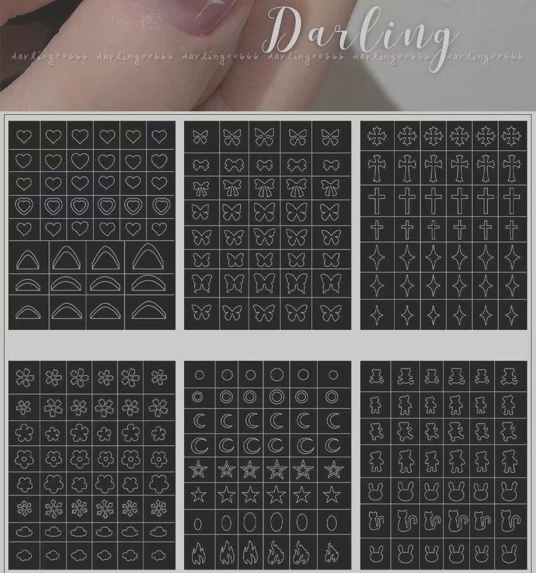 A set of nail stickers with various designs including flowers, hearts, stars, and butterflies, displayed against a transparent background.