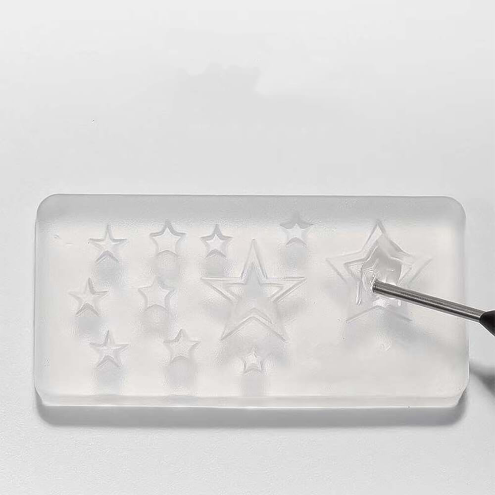 Close-up of thick molding gel being dispensed showing self-supporting consistency