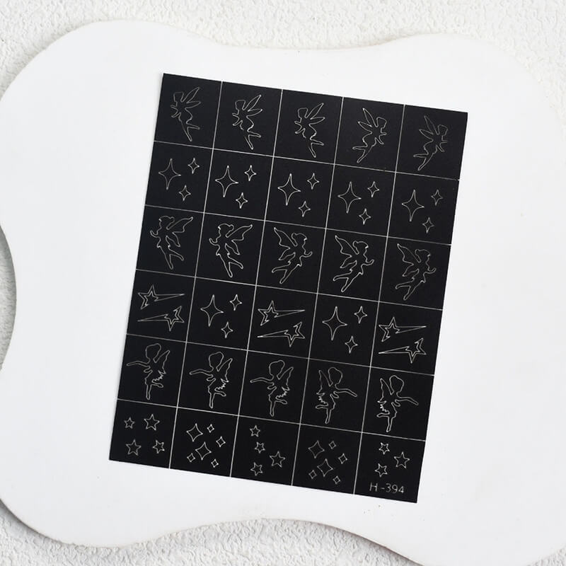 Nail art sticker sheet featuring stars and elf