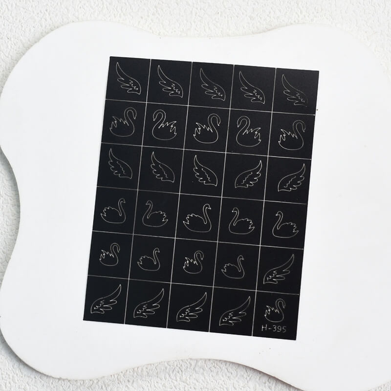 Nail art sticker sheet featuring goose and wings