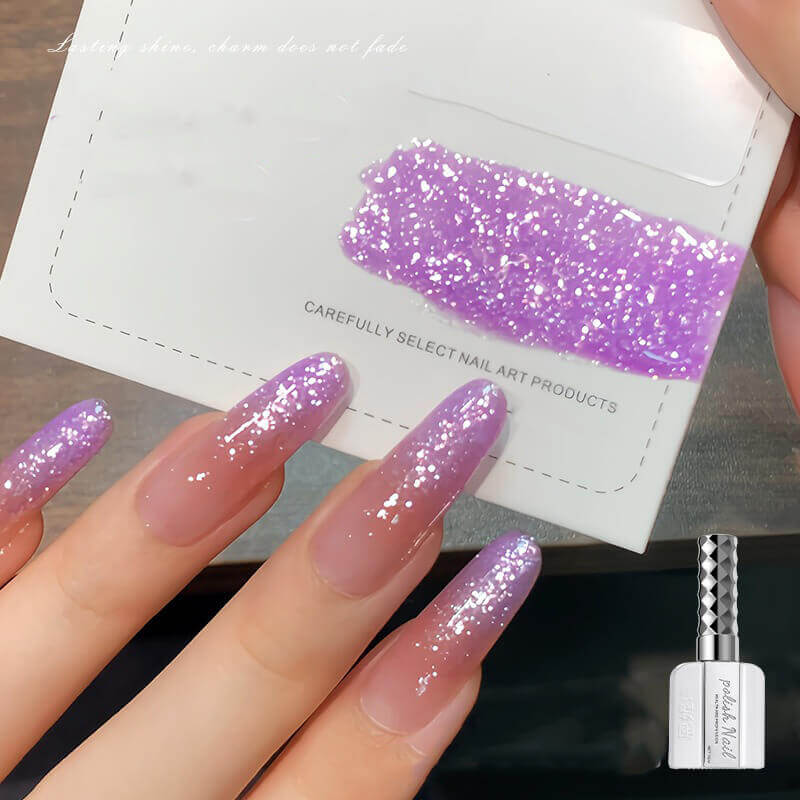 Fine sparkle nail art gel creating delicate shimmer effect like fresh snow catching light-purple