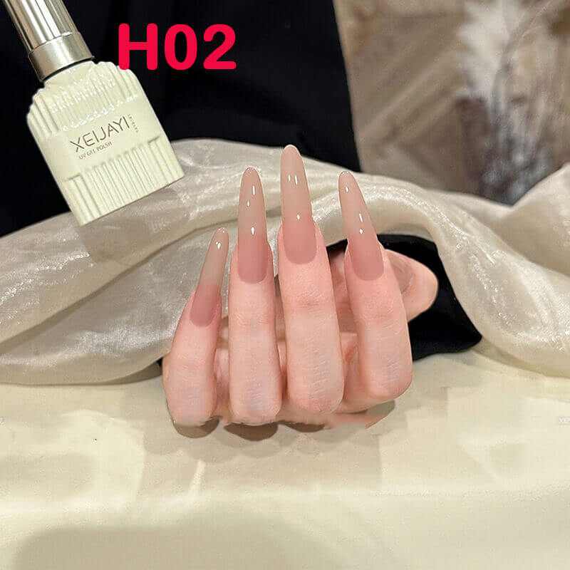Nude foundation gel serving as base for detailed nail art designs.