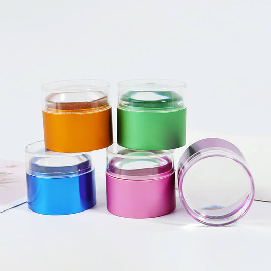 A collection of high-viscosity silicone nail art stamps in various colors including yellow, green, blue, and pink.