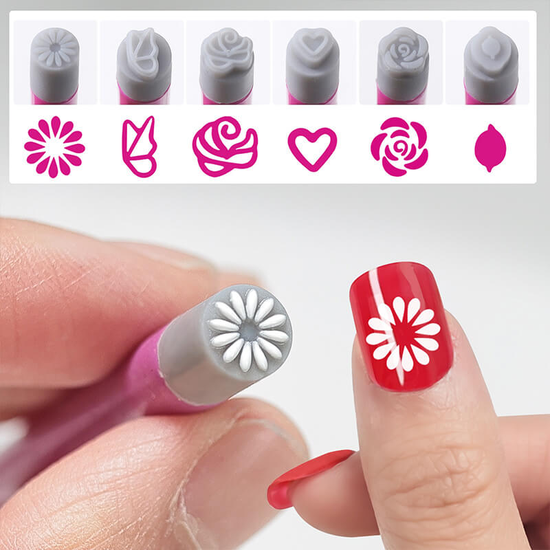 Nail art stamping tool with red nail and floral design, surrounded by stamping plates and designs.