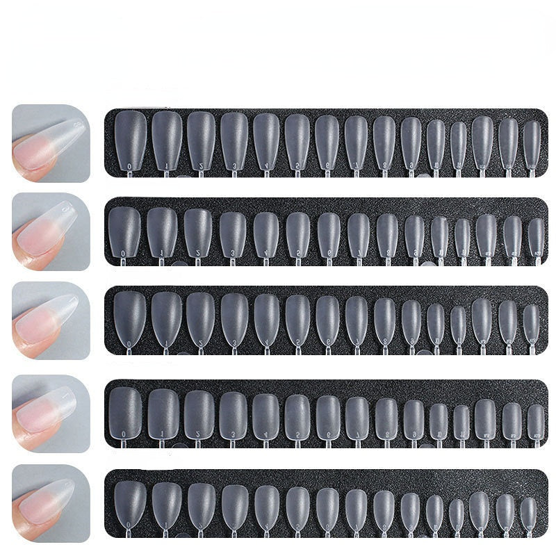 Clear coffin press on nail tips in extra length with matte acrylic finish arranged in sizes