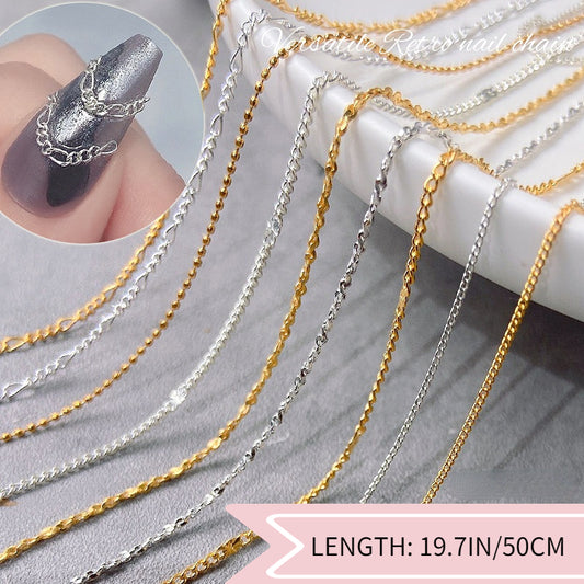 Multiple gold and silver nail chains with decorative elements, displayed on a flat surface.