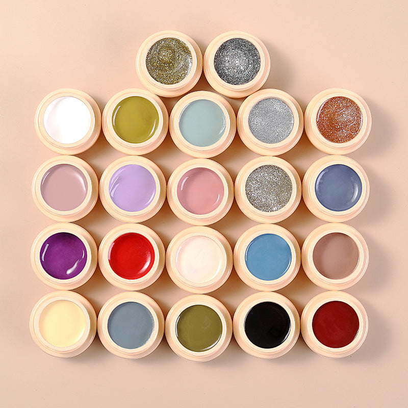 An array of nail gel polish pots in various colors, including beige, black, blue, green, orange, purple, red, and silver.