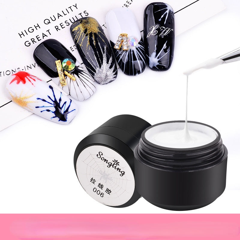 A bottle of Spider Gel for nail art with several examples of nail polish designs showcasing the product's capability. The main color of the gel appears to be clear or close to clear, and the bottle has a black cap with white and gold text.